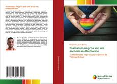 Buchcover von Diamantes negros sob um arco-íris multicolorido