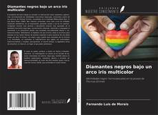 Buchcover von Diamantes negros bajo un arco iris multicolor