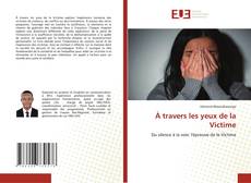 Copertina di À travers les yeux de la Victime